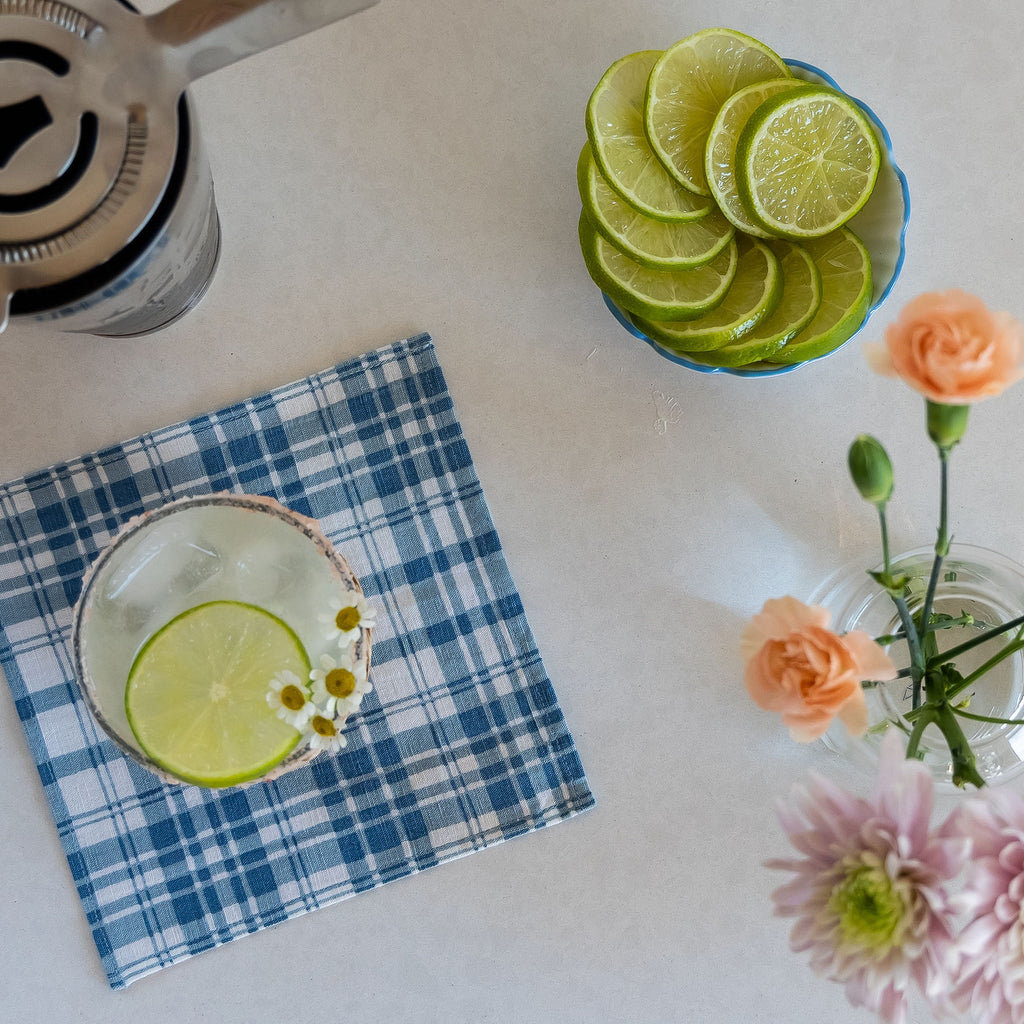 Summer cocktail and linen coasters featuring the Coronado cocktail napkin set.