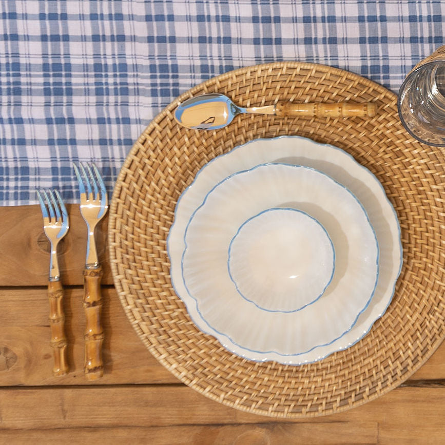 A captivating Coronado table runner in a rich blue hue, elevating any table setting with elegance and style